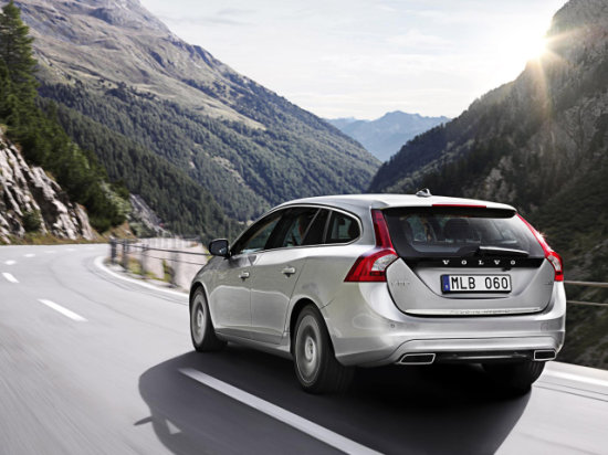 Rear view of Volvo V60 plug-in hybrid vehicle with integrated tail pipes